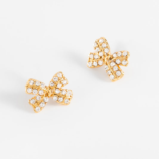 Aretes en baño de oro moño piedras toque brillante cristal