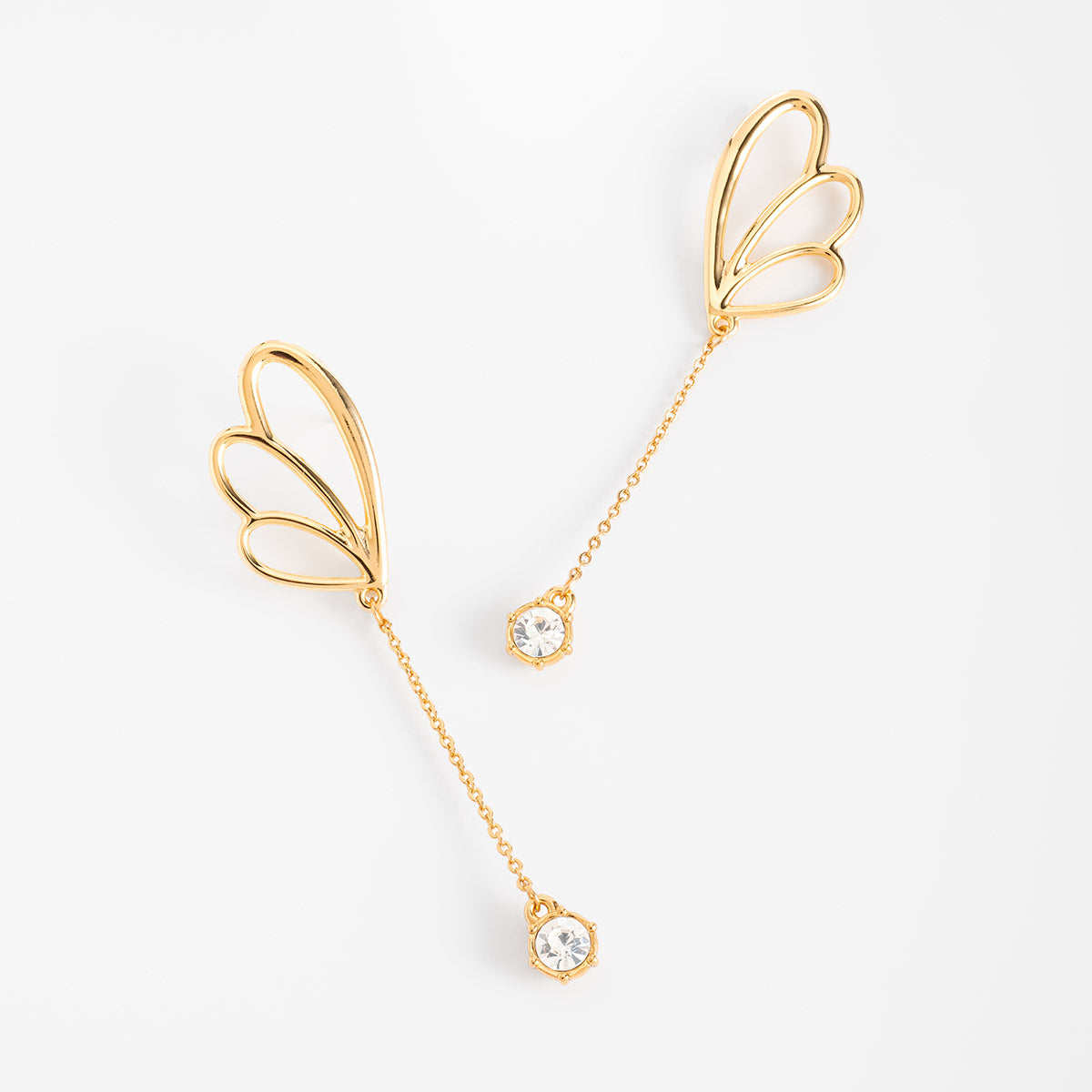 Aretes en baño de oro inspiración pétalos con piedra brillante