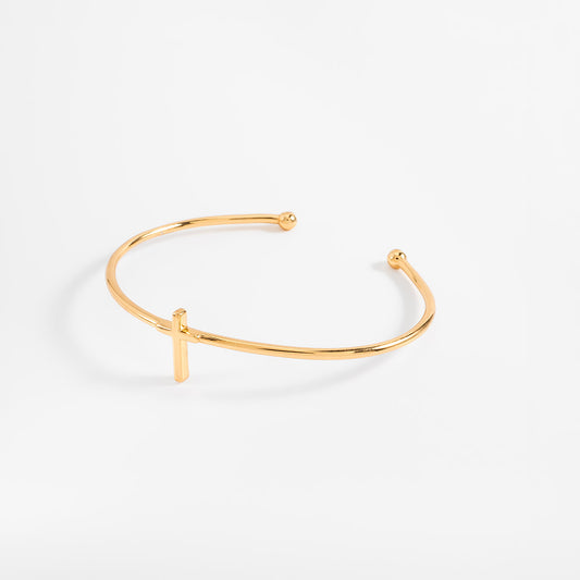 Pulsera en baño de oro diseño cruz minimalista abierta