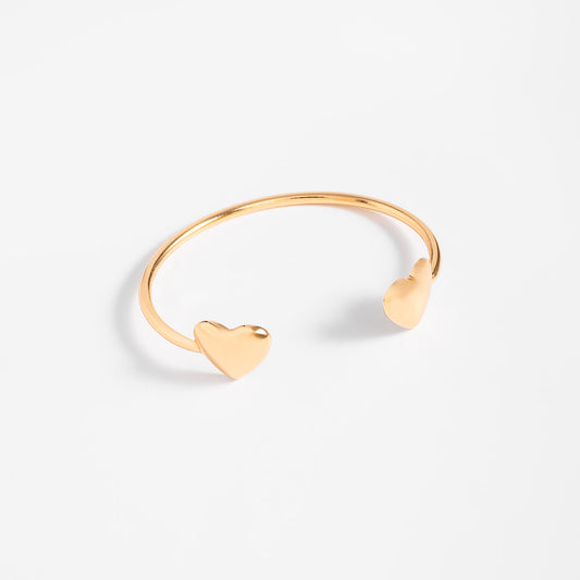 Pulsera con extremos de corazón pulido