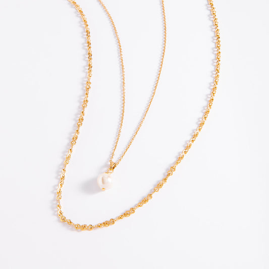 Collar con doble cadena y perla tono crema