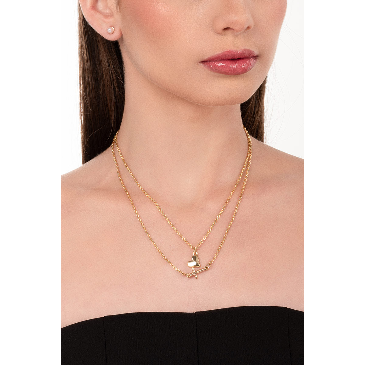 Collar doble con dije de cruz y corazón