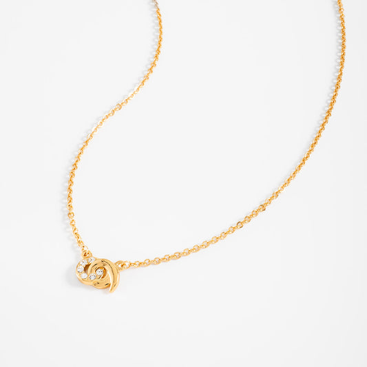 Collar en baño de oro con diseño circular y piedras brillante